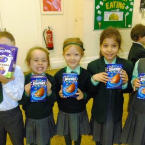 children holding easter eggs