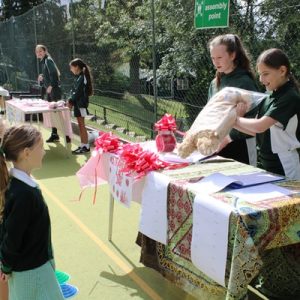 girls setting up stalls