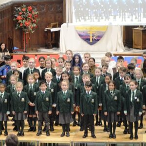 children stood on a stage